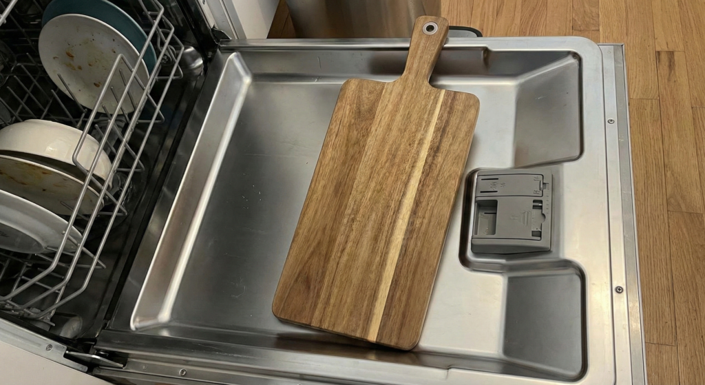 Tall dishes blocking dishwasher soap dispenser causing unwashed dishes.